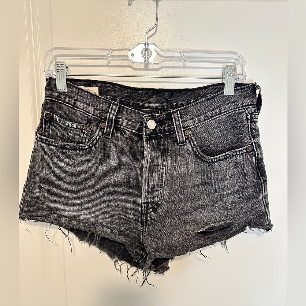LEVIS 501 Black distressed jean shorts size 26